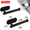 Two black metal adhesive paper dispenser racks shown in a close-up view.