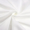 White fabric folds creating a spiral shape for home decor