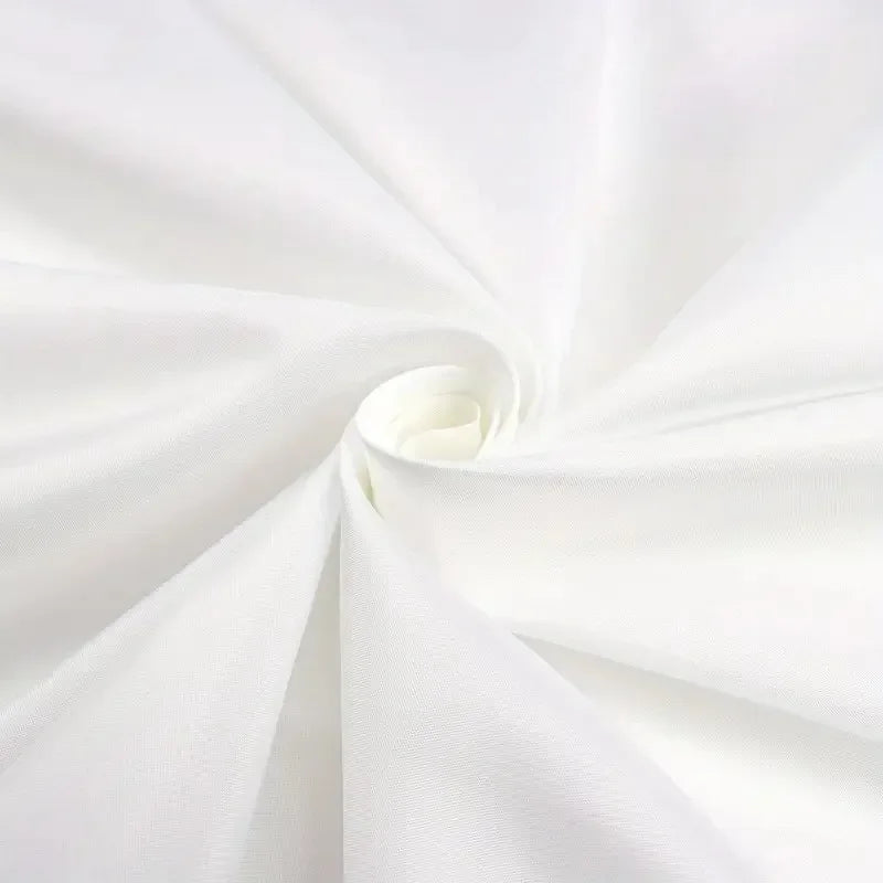 White fabric folds creating a spiral shape for home decor