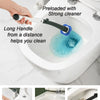 A hand uses a long-handled disposable toilet brush to clean the inside of a toilet bowl.