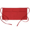A bright red fashion chef short apron with pockets shown flat.