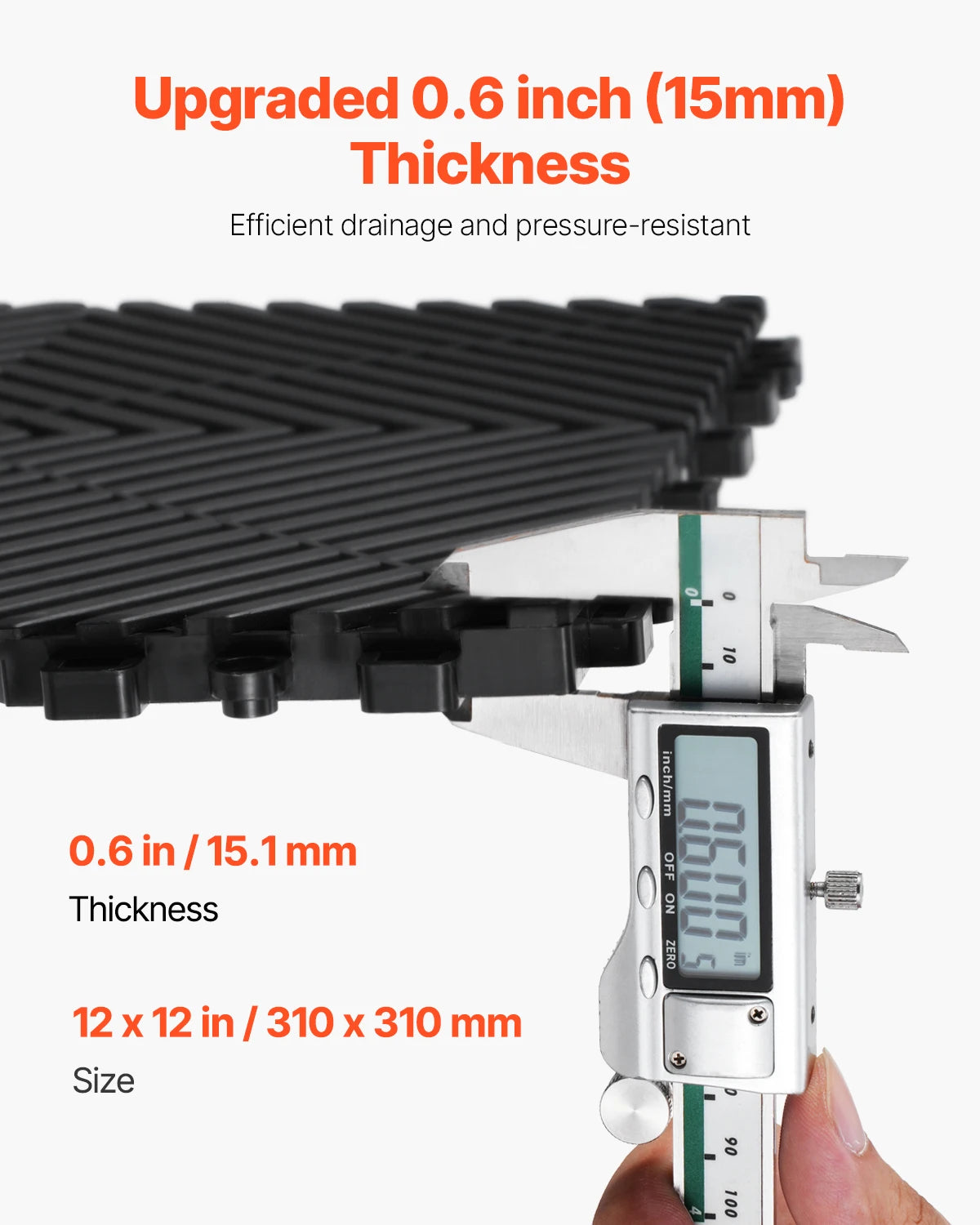 A close-up view of an upgraded 0.6 inch thick interlocking drainage mat, showing its size and features.