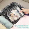 A black travel makeup organizer bag with a clear inner compartment showing various cosmetic products.