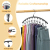 Curved metal hangers with 10 clips used to organize clothing on a wooden rod.