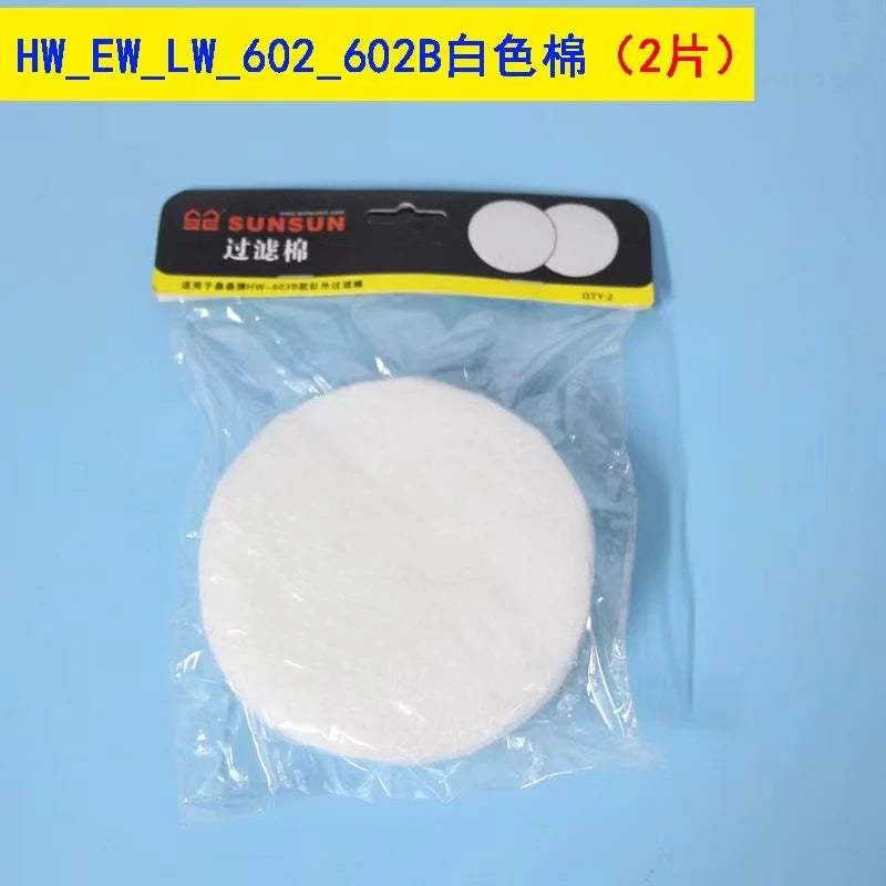 A white replacement filter media disk packaged in a clear plastic bag.