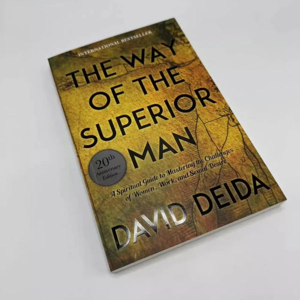 A book titled The Way of the Superior Man by David Deida with a gold and brown cover.