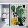 A shower curtain featuring large green and yellow botanical patterns for bathroom decor.