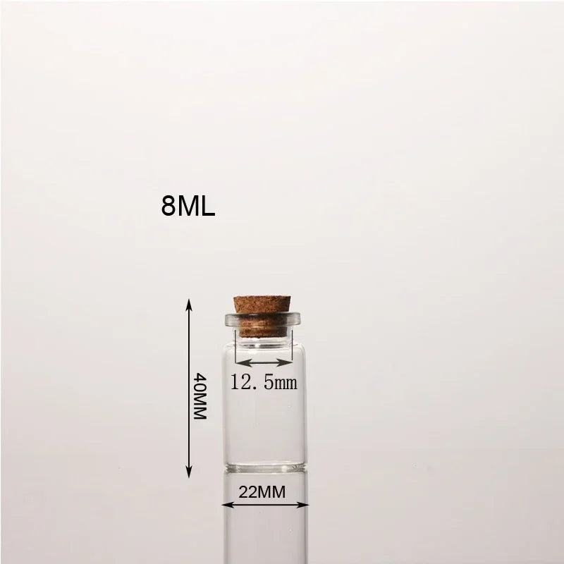 A clear glass bottle with a cork, labeled 8ML, shown next to a measurement scale.