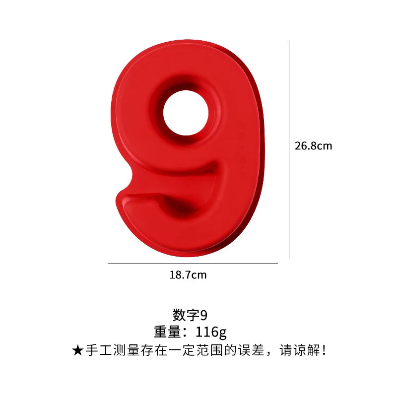 A red silicone number 9 cake mold with dimensions 26.8cm by 18.7cm.