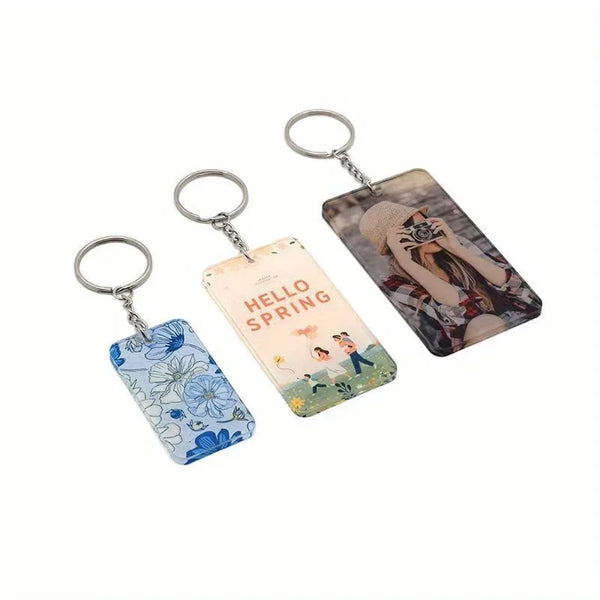 Two acrylic keychains featuring custom photos and logos on a light background