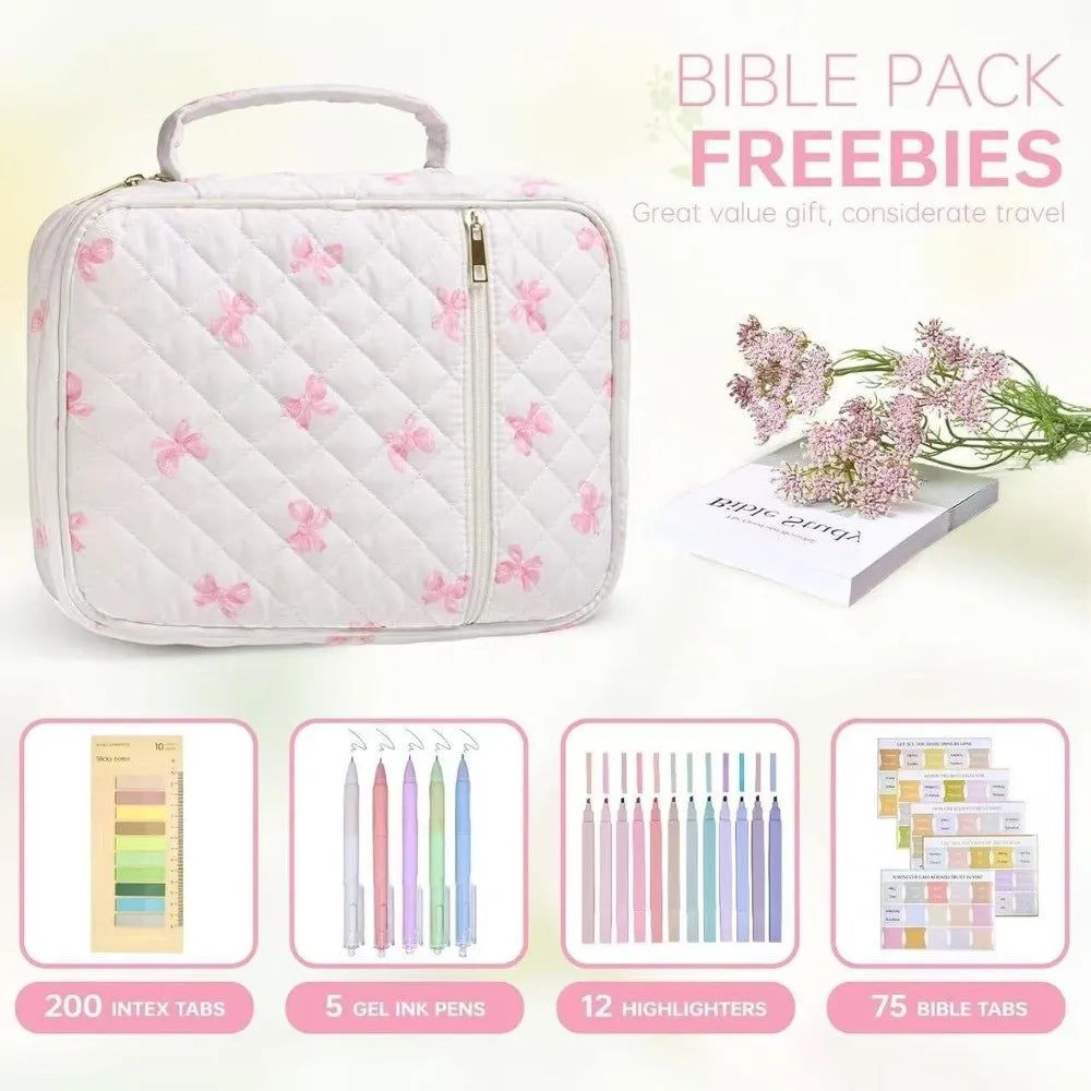 A pink floral quilted Bible pack with a zipper and handle, shown next to various stationery items.