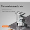A close-up view of a stainless steel shower head holder designed for various surfaces, demonstrating its use on tile, wood, g