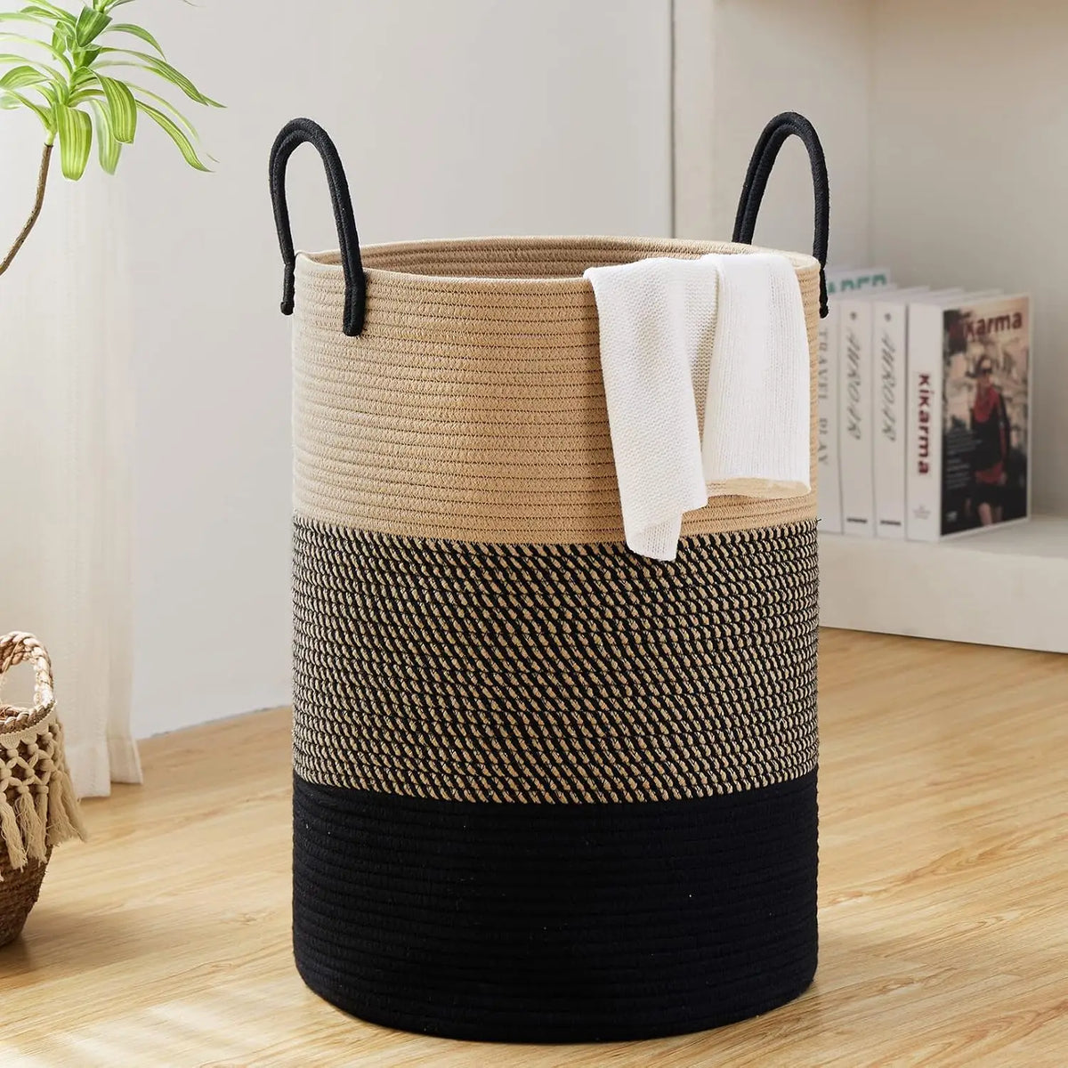 Large woven storage hamper in beige, black, and dark gray with handles
