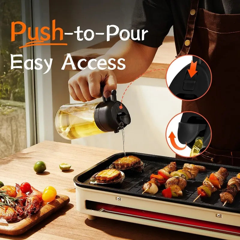 A hand is using a push-to-pour oil spray bottle to dispense oil onto food being cooked on a grill pan.