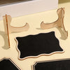 A set of mini wooden chalkboard signs and mounting pieces for crafting or display.