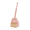 A pink toddler mini broom and dustpan set with a handle and brush.