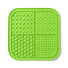 A bright lime green silicone lick mat designed for dogs and cats with various textured surfaces.