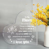 A clear acrylic heart-shaped keepsake engraved with the message I love you Mom for her special and little things.