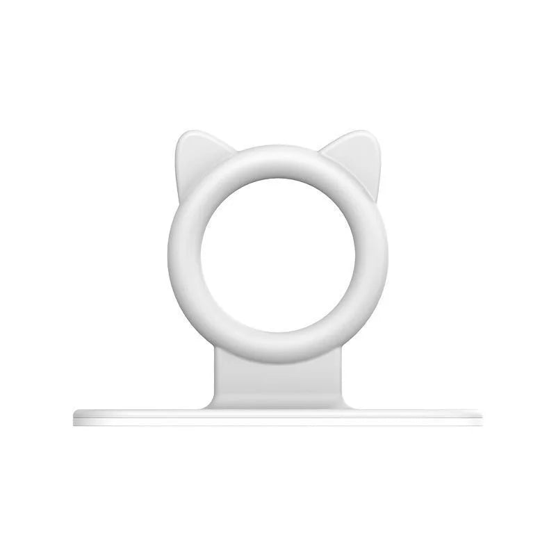 A white silicone self-adhesive cabinet door handle lifter with a cat-ear design.