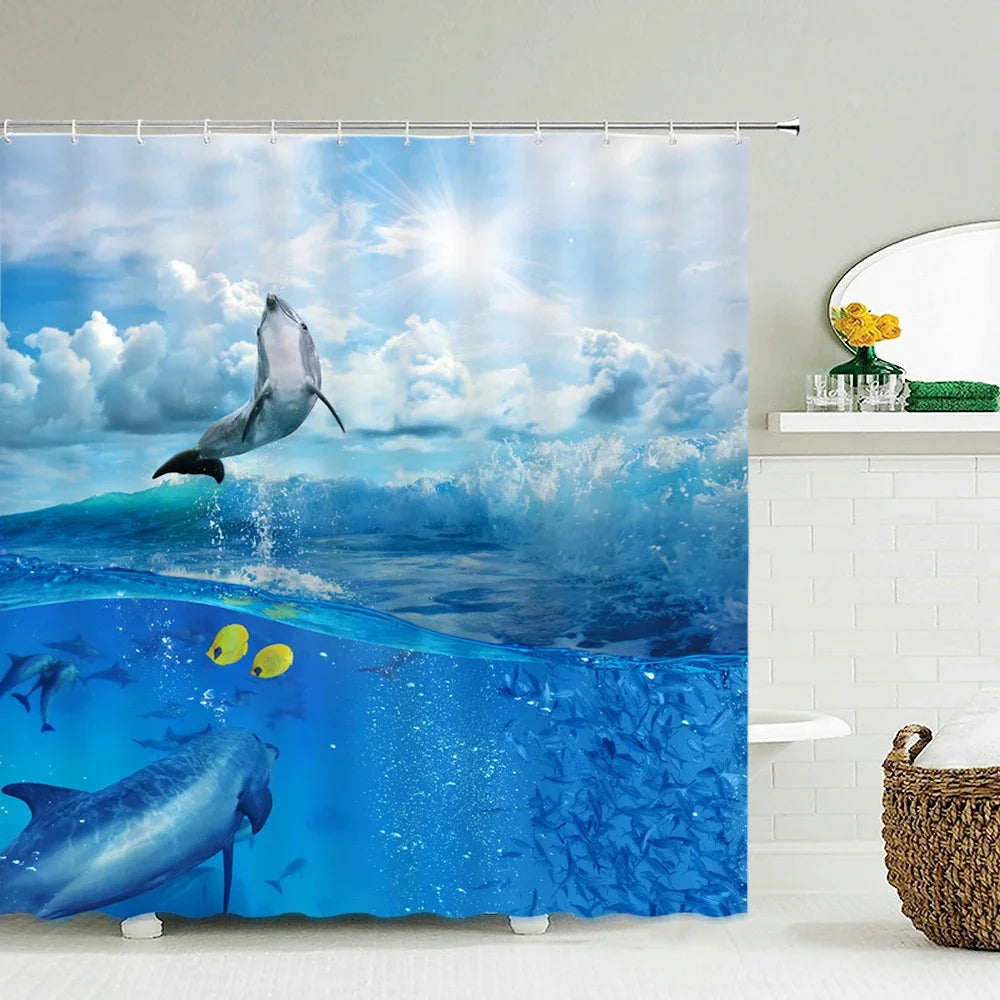 A vibrant shower curtain featuring a marine scene with dolphins jumping over a blue ocean and underwater.