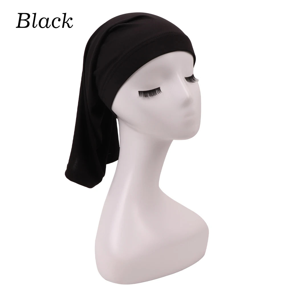 Black spandex dreadlock tube cap for hair protection displayed on a mannequin head.