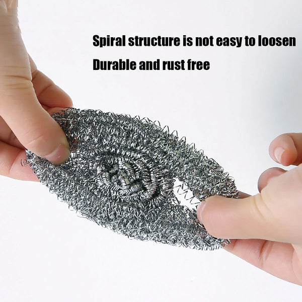A hand is holding a black spiral structure scrubber pad, demonstrating its durable and rust-free nature.