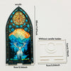 Porta velas de acrílico decorativo gótico con silueta de ciervo y diseño de sol brillante.