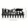 Black metal wall hook key holder featuring a silhouette of a cat and the words HOME SWEET HOME