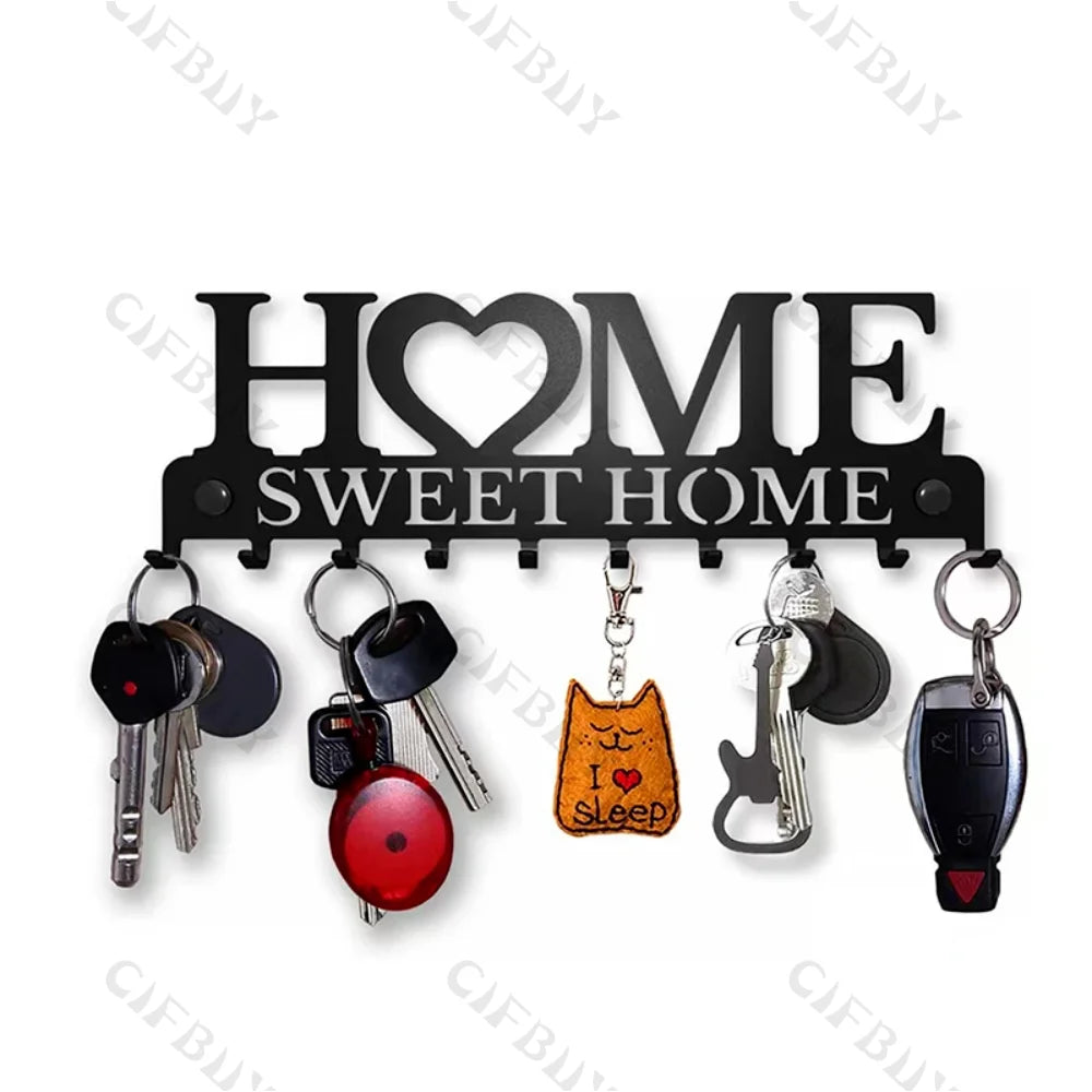 A black rustic metal wall hook key holder featuring a silhouette of a cat and the words Sweet Home.