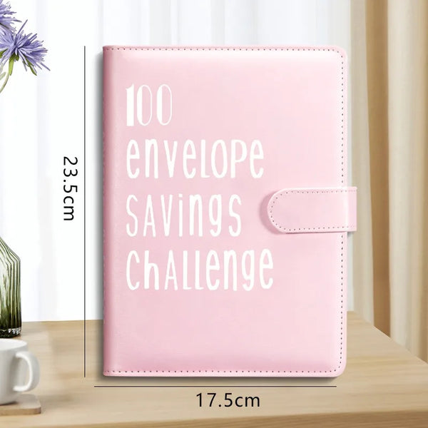 A pink budget challenge binder featuring 100 envelopes for savings and challenge.