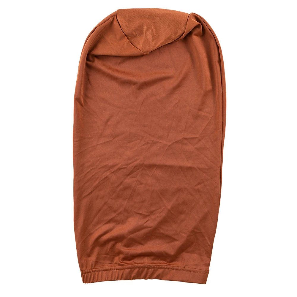 A terracotta-colored satin hair bonnet for dreadlocks and braids.