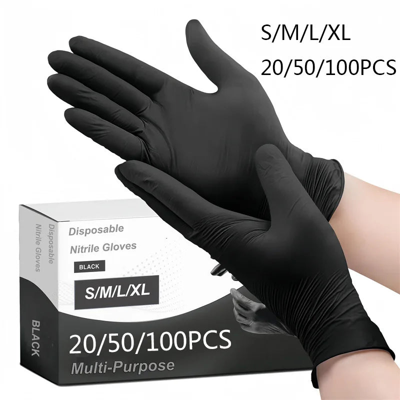A hand wearing a black disposable nitrile glove is shown next to its packaging box.