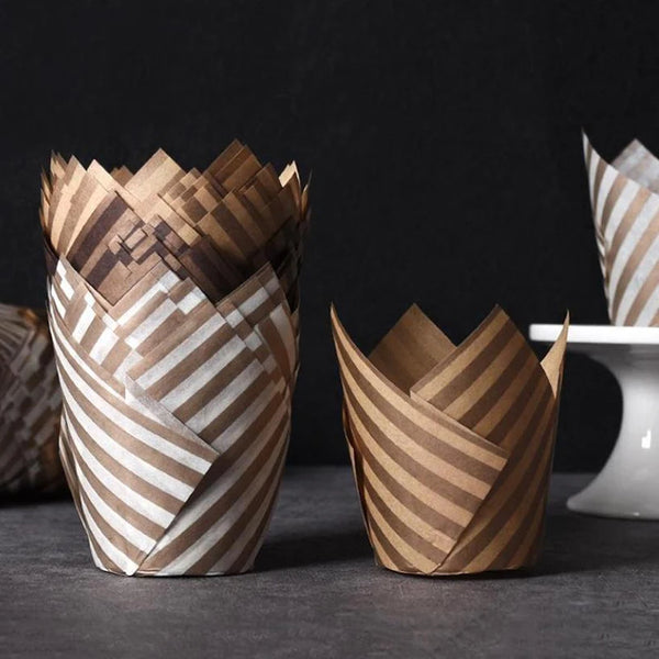 A stack of 50 tulip cupcake liners made from brown and white striped paper.