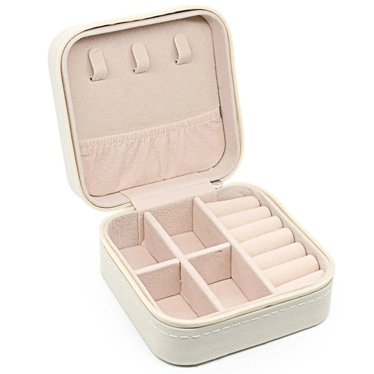 A light pink portable PU leather jewelry storage box with a hinged lid and divided compartments.