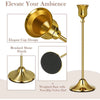 A set of six gold weighted metal taper candlestick holders with elegant cup designs and a brushed shine finish.