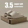 White Cloud Comfort EVA slides with a 3.5 cm thick bottom resting on a wooden block.