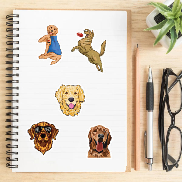A set of dog stickers featuring various breeds including a golden retriever, a hound, and a bulldog, placed on lined paper.