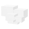 A stack of white acrylic risers used for food display.