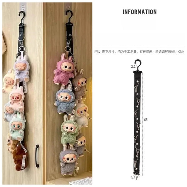 A vertical display rack featuring various Labubu figures in different colors and sizes.