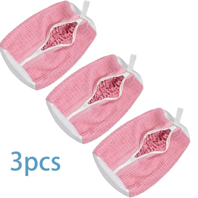Three pink reusable shoe washing bags with an invisible zipper detail