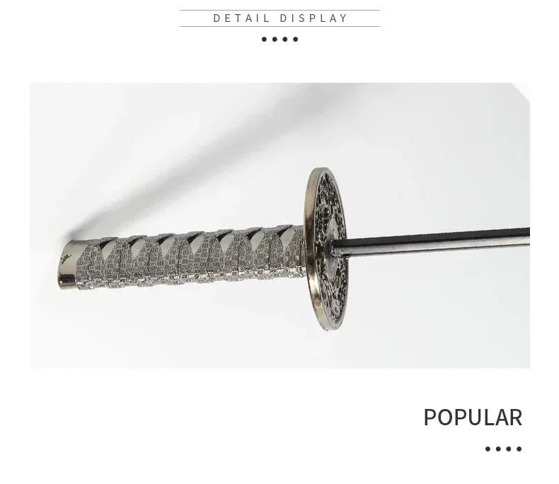 A close-up display of a folding katana sword umbrella with a textured handle and blade.