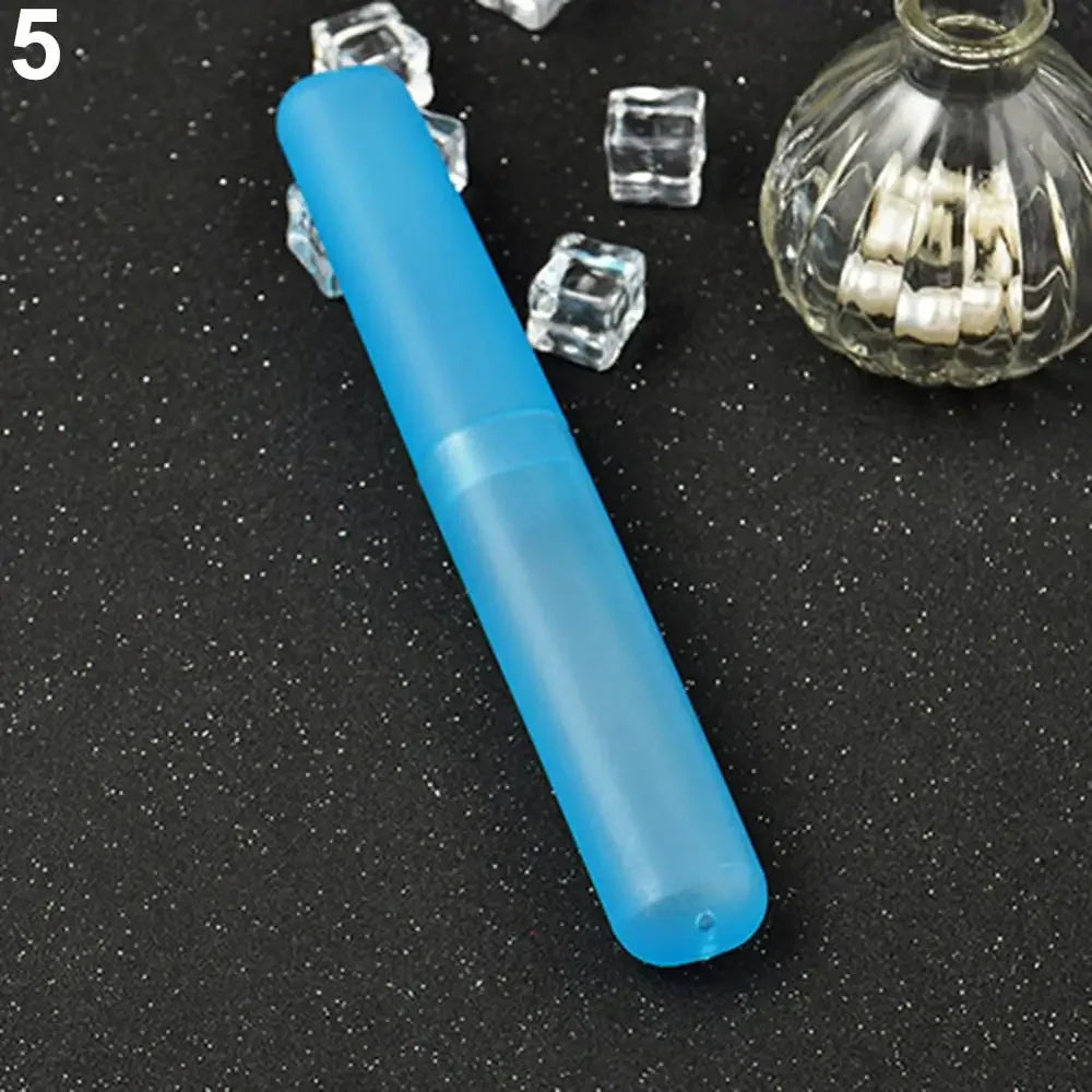 A light blue cylindrical toothbrush case next to several clear ice cubes and a glass jar filled with white teeth.