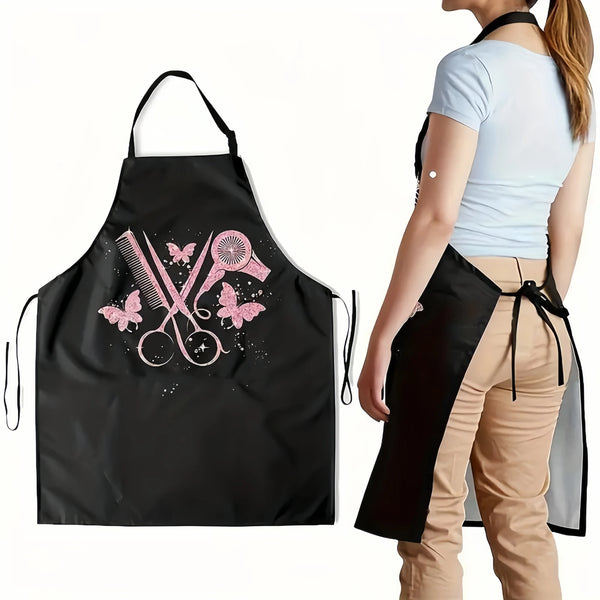 Black apron with pink butterfly and scissors embroidery worn by a person.