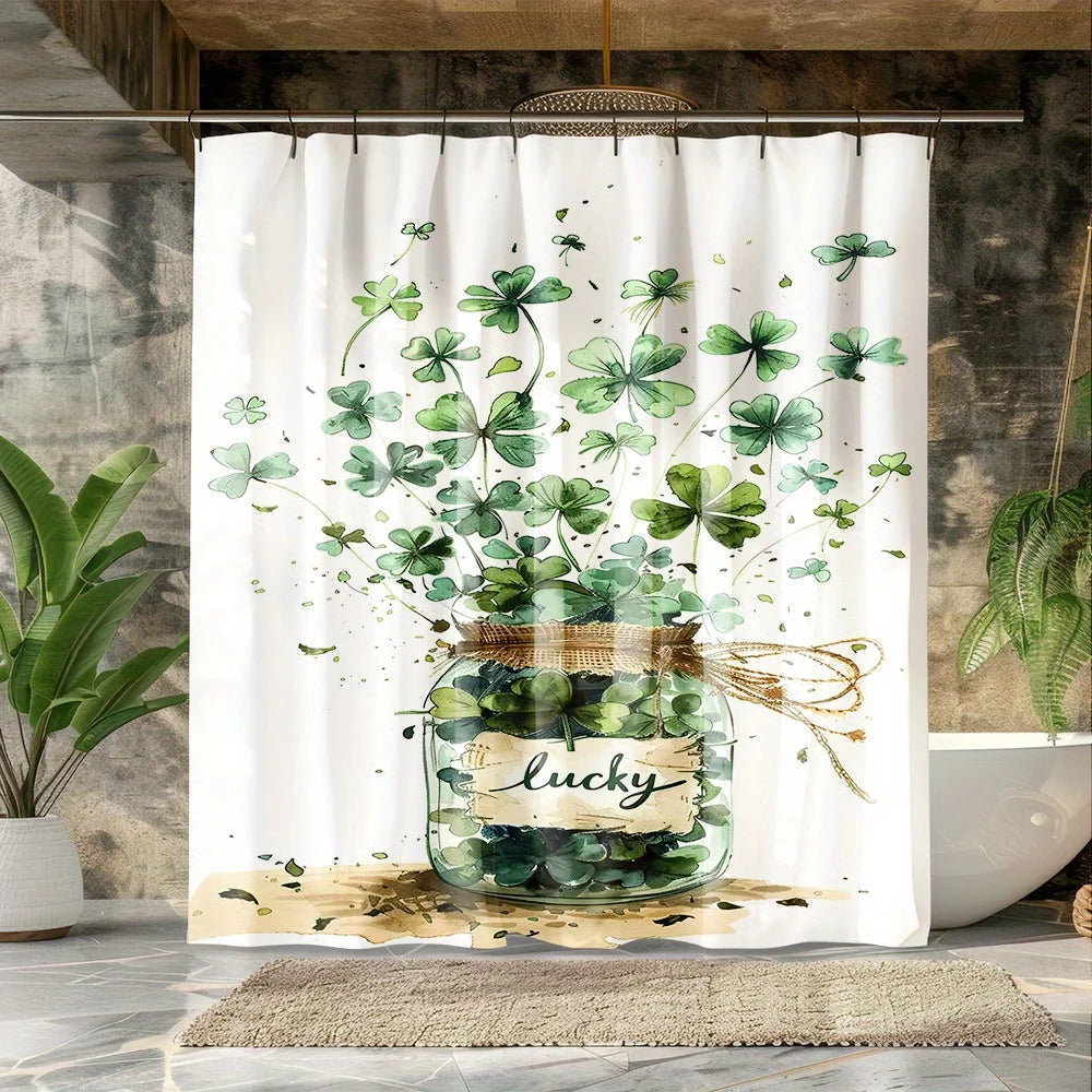 A white shower curtain featuring a watercolor design of green four-leaf clovers and butterflies in a glass jar.