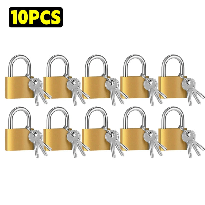 Un jeu de dix mini cadenas en cuivre avec clés argentées, adapté aux bagages et sacs.