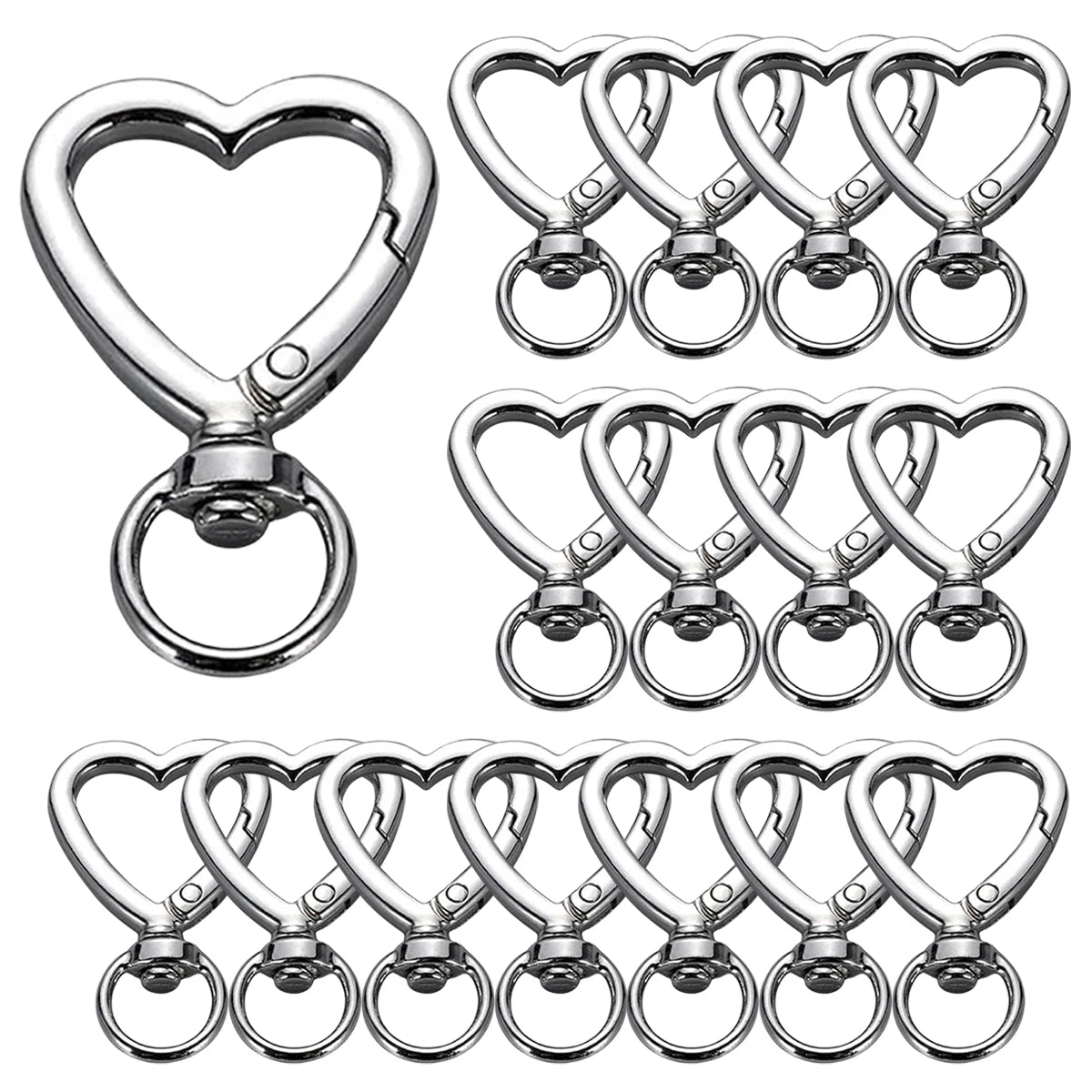 A set of heart-shaped spring hook keychains made of silver metal.