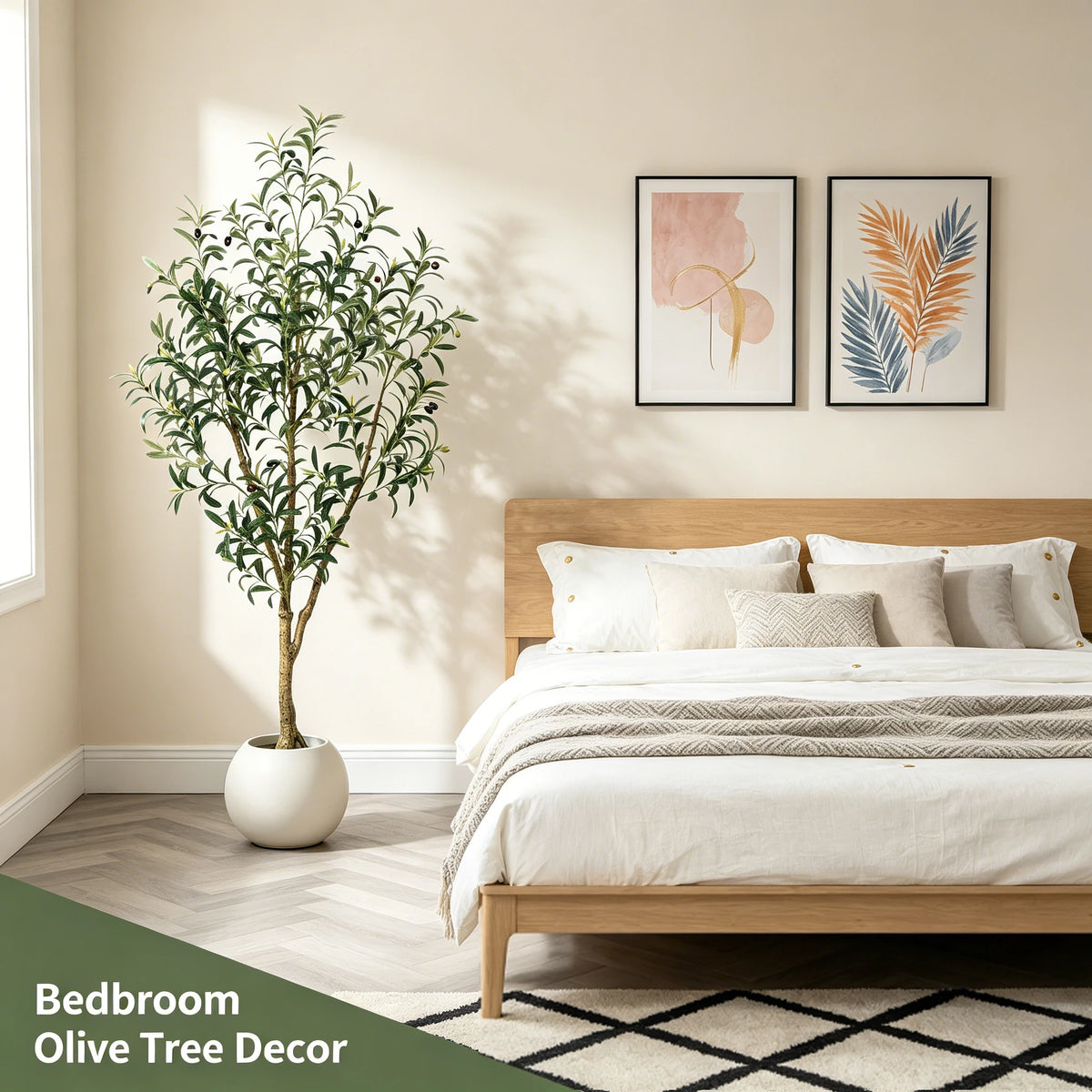 An artificial indoor olive tree in a white pot decorates a bedroom setting with natural light.
