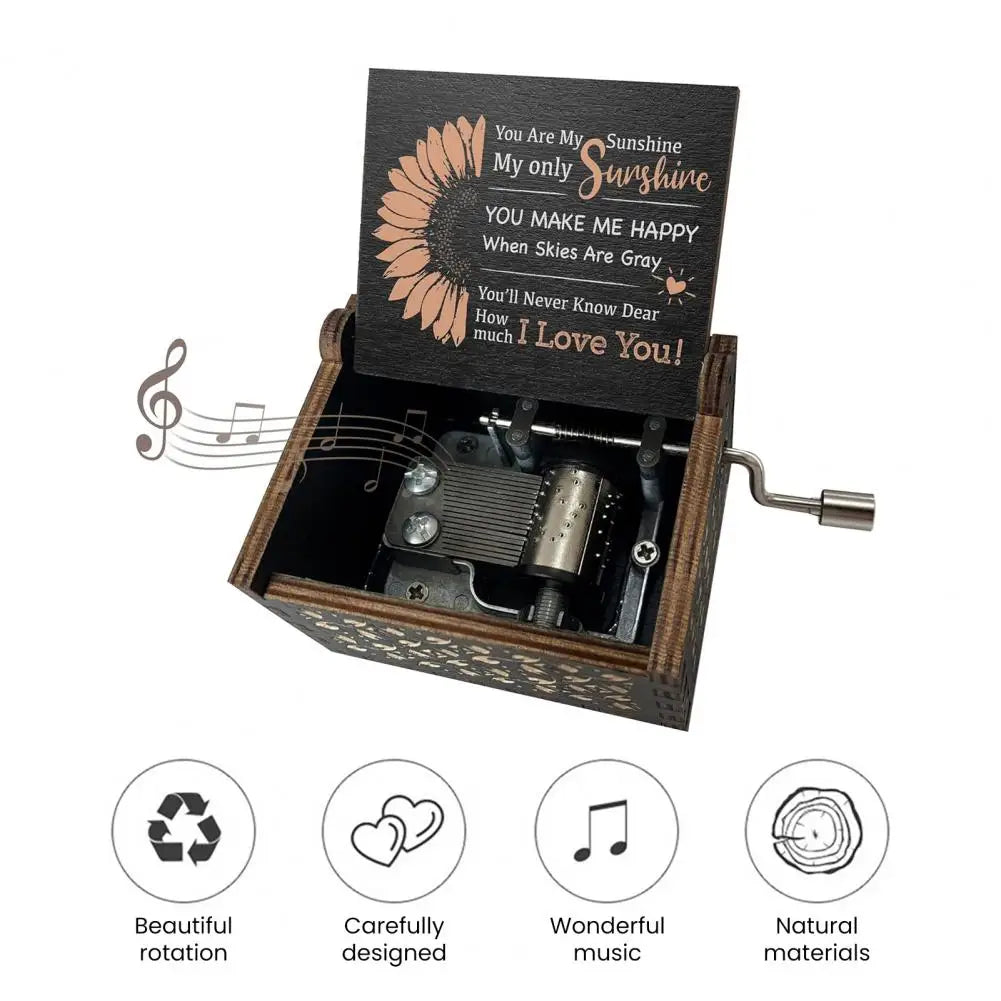 A small wooden music box with an engraved message inside, featuring beautiful rotation, careful design, wonderful music, and 