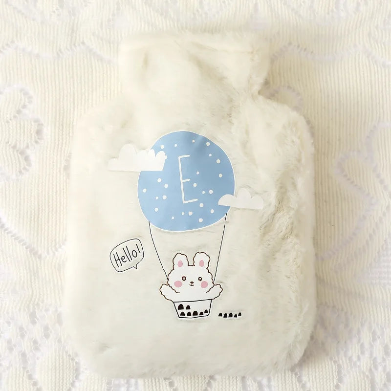 A white plush cartoon hot water bottle featuring a blue cloud design and a rabbit character.