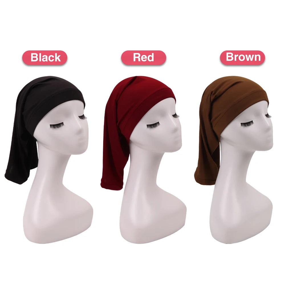 Three hair protection tube caps in black, red, and brown displayed on white mannequins.